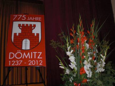 Plakat zum Stadtjubilum mit Blumenbouquet